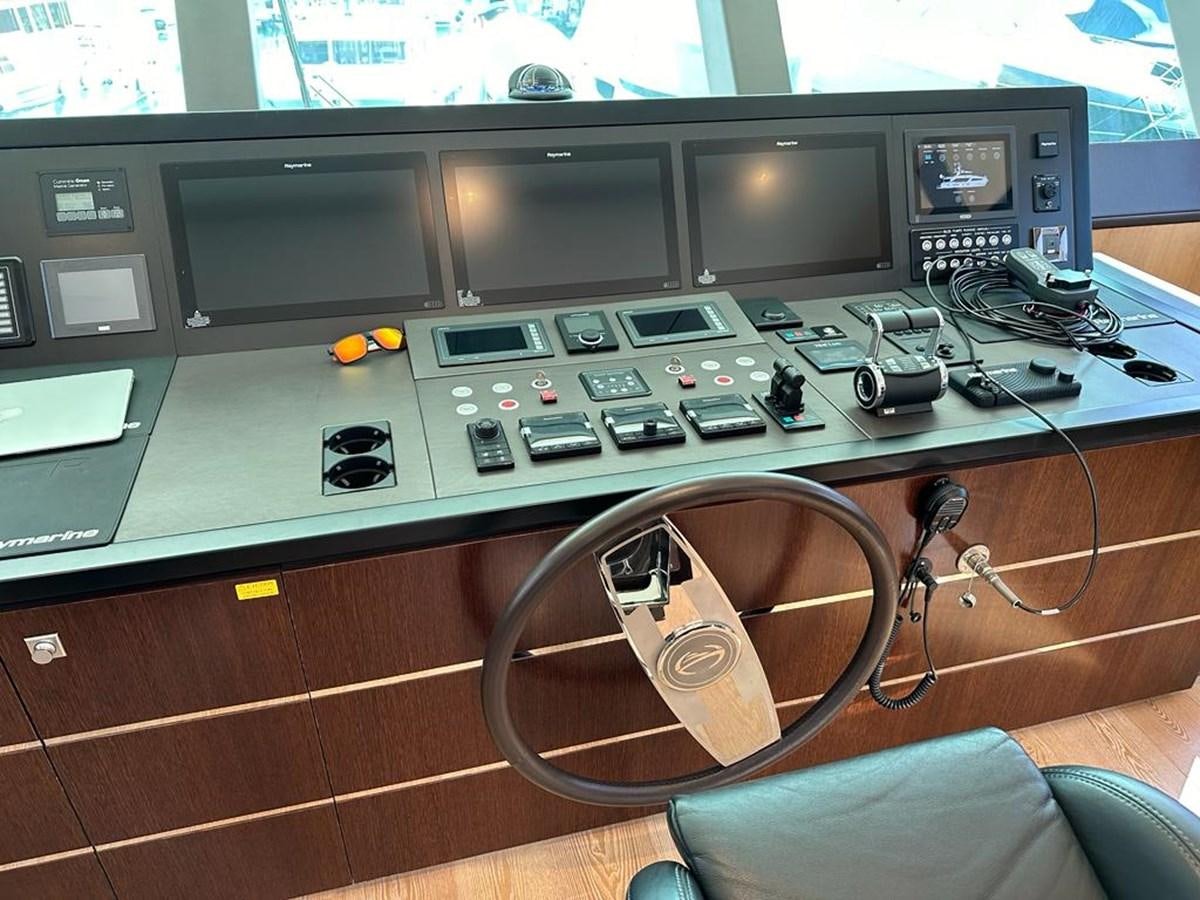 a video game console with a game controller and a game console aboard BLACK SOIL Yacht for Sale