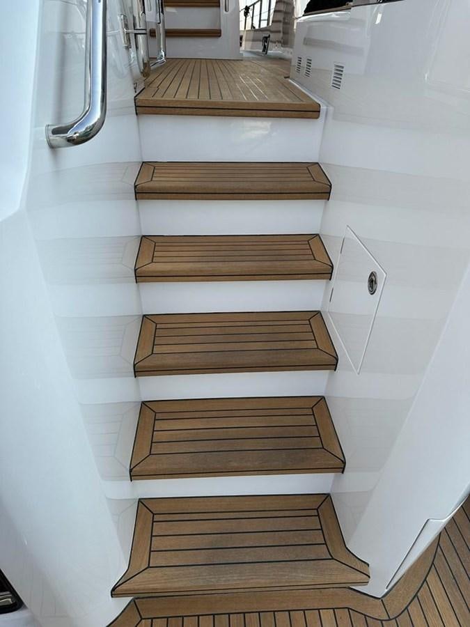 a set of stairs in a room aboard BLACK SOIL Yacht for Sale