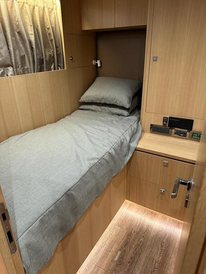 a bed in a room aboard BLACK SOIL Yacht for Sale