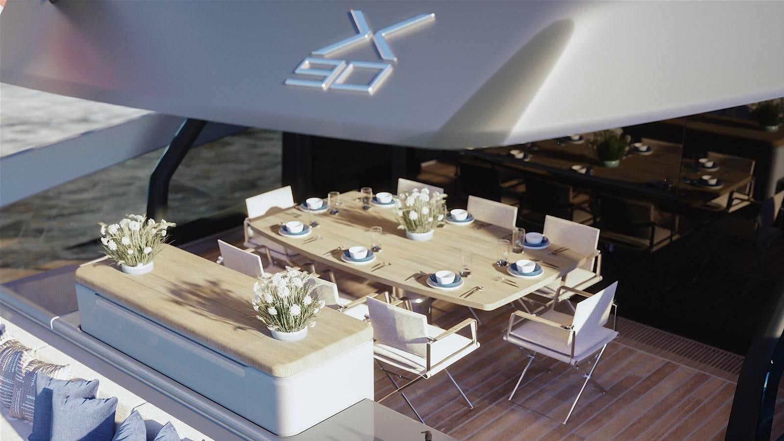 a room with a table and chairs aboard X90 FAST Yacht for Sale