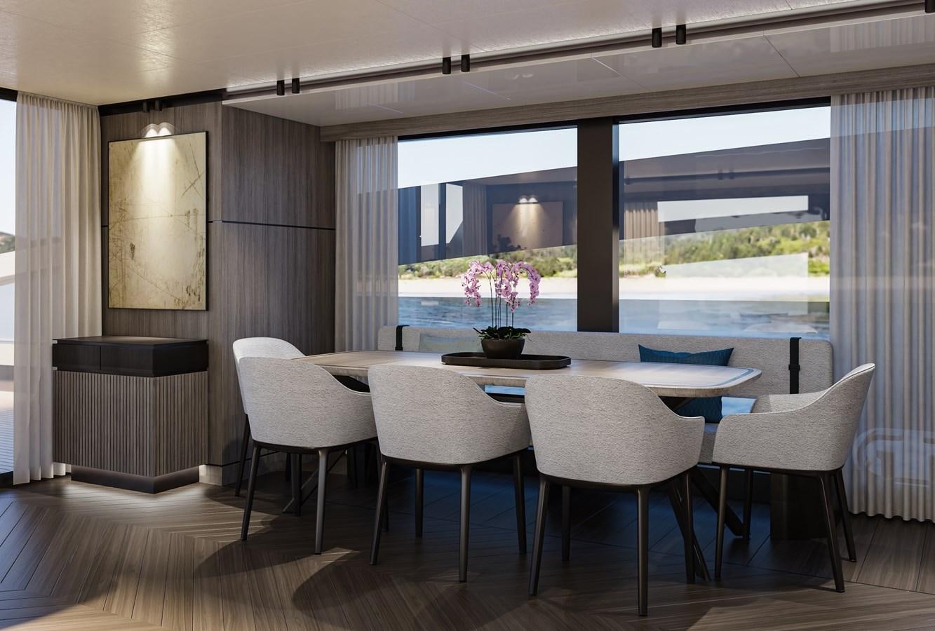a room with a table and chairs aboard X90 FAST Yacht for Sale