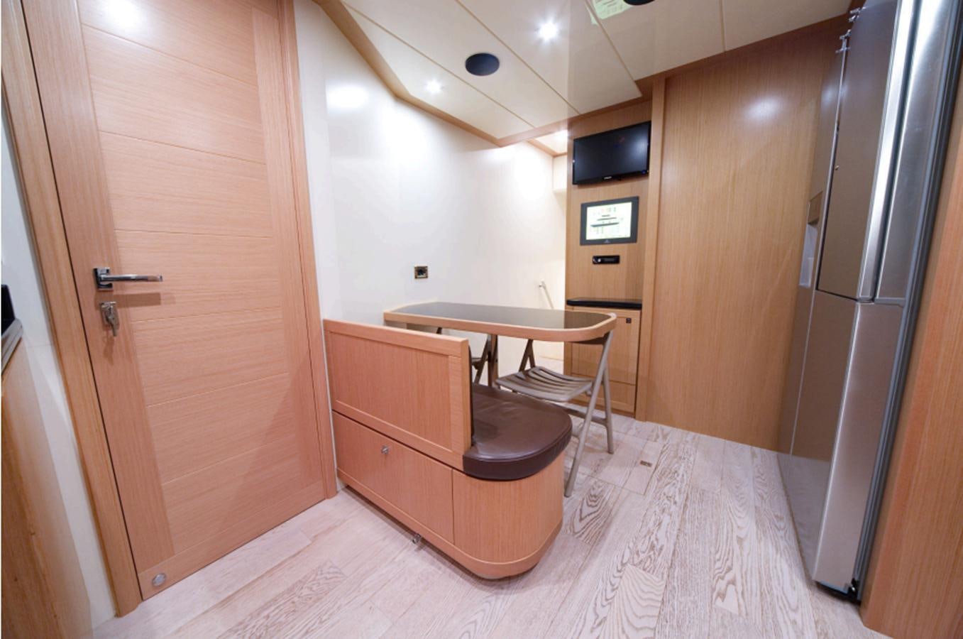 a room with a table and chairs aboard ALL WE NEED FOR TODAY Yacht for Sale