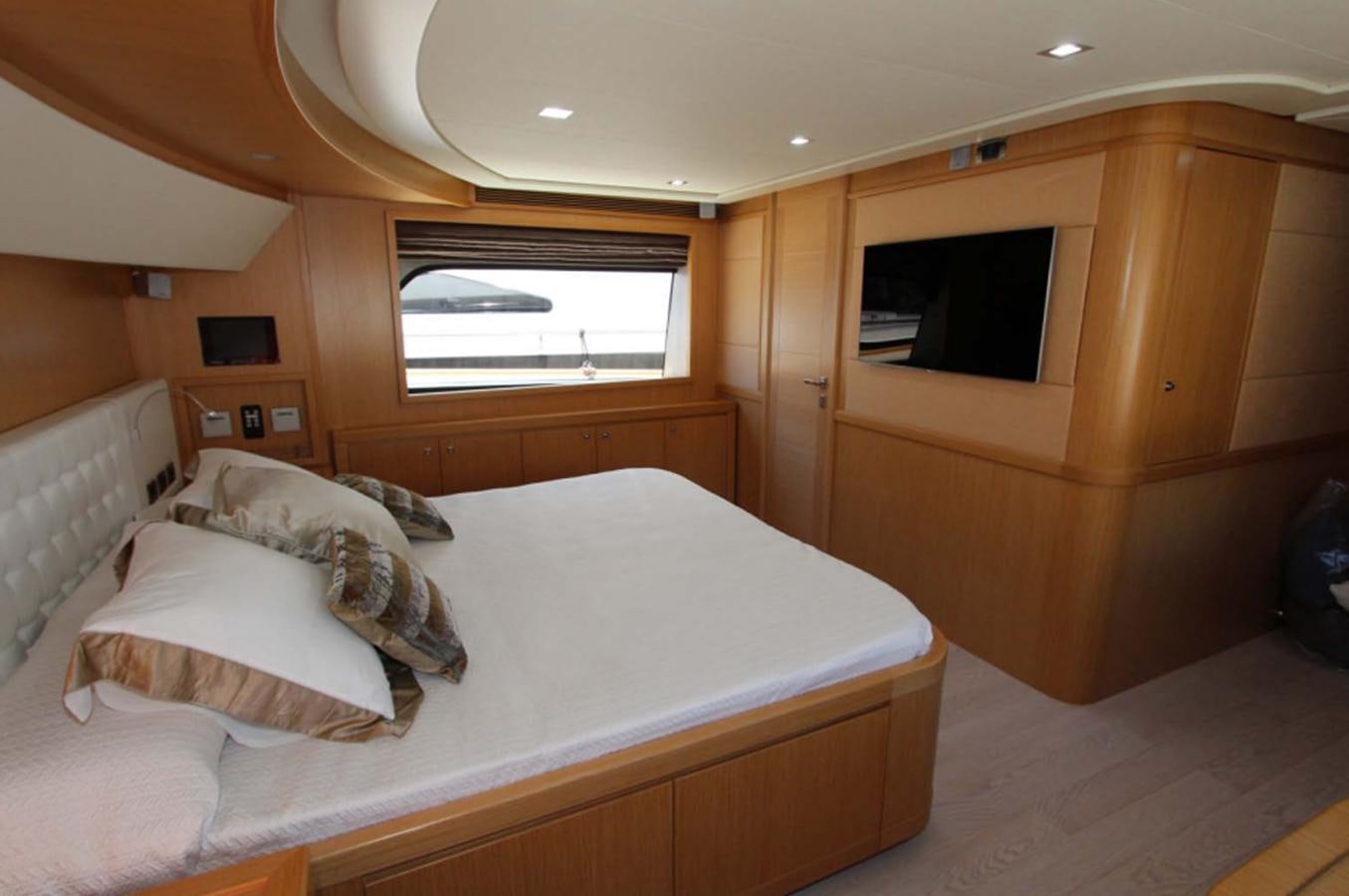 a bed with white sheets aboard ALL WE NEED FOR TODAY Yacht for Sale