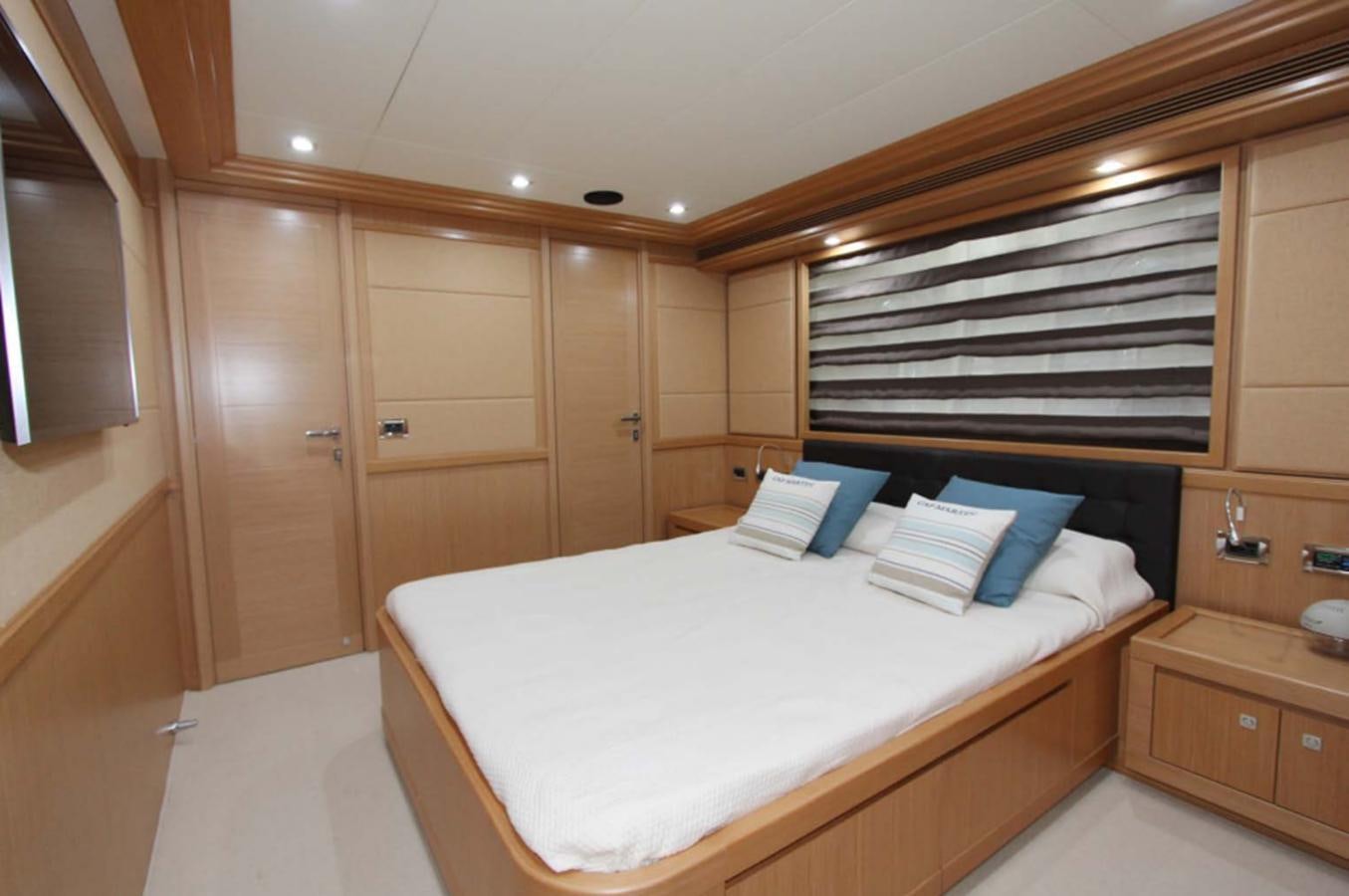 a bed in a room aboard ALL WE NEED FOR TODAY Yacht for Sale