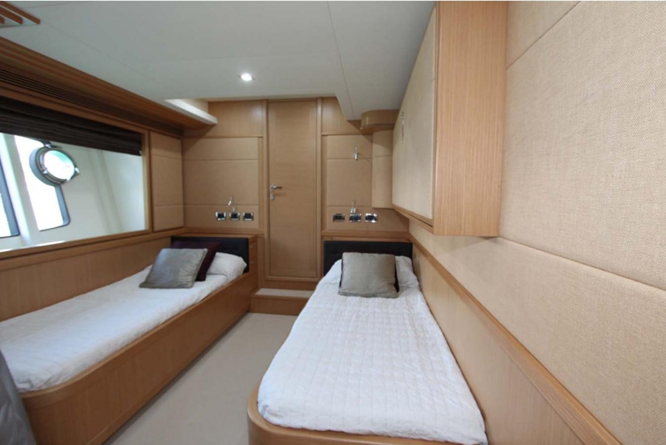 a room with a couple of beds aboard ALL WE NEED FOR TODAY Yacht for Sale