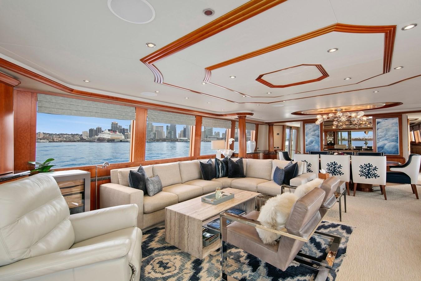 a living room with a large window aboard DESPERADO Yacht for Sale