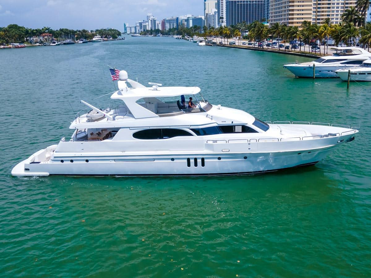a white boat in the water aboard OLD SPORT II Yacht for Sale