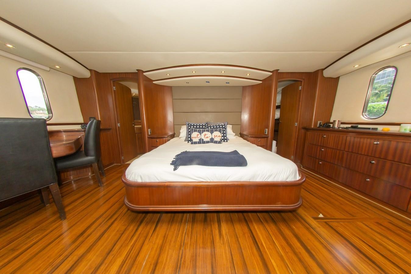 a bed in a room aboard OLD SPORT II Yacht for Sale