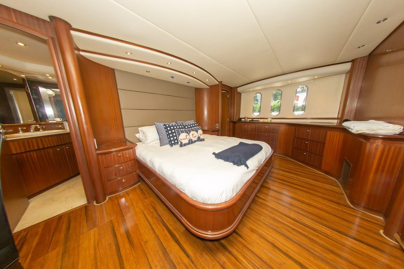 a bedroom with a bed aboard OLD SPORT II Yacht for Sale
