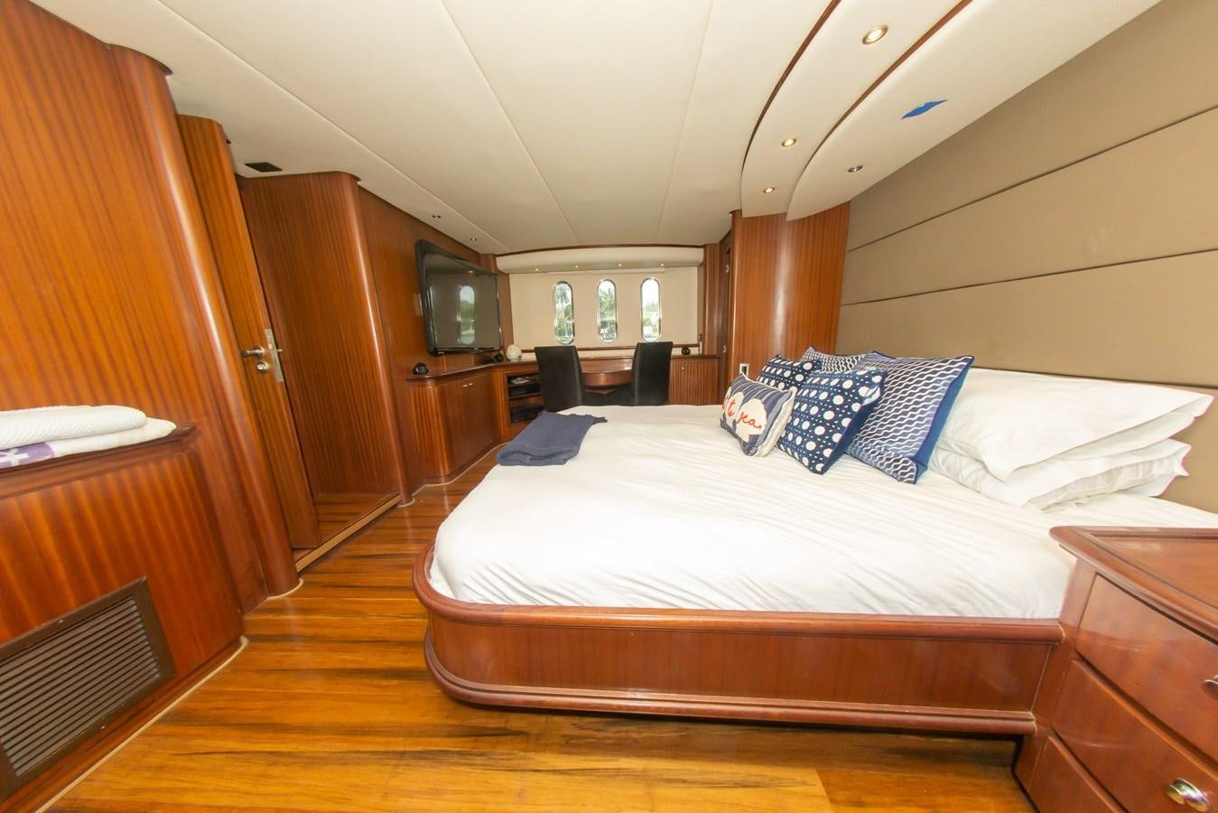 a bed in a room aboard OLD SPORT II Yacht for Sale