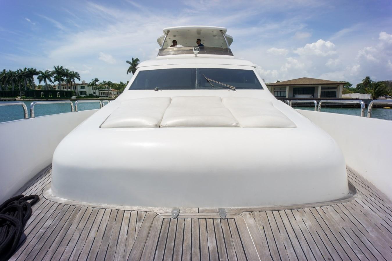 a white yacht on a dock aboard OLD SPORT II Yacht for Sale