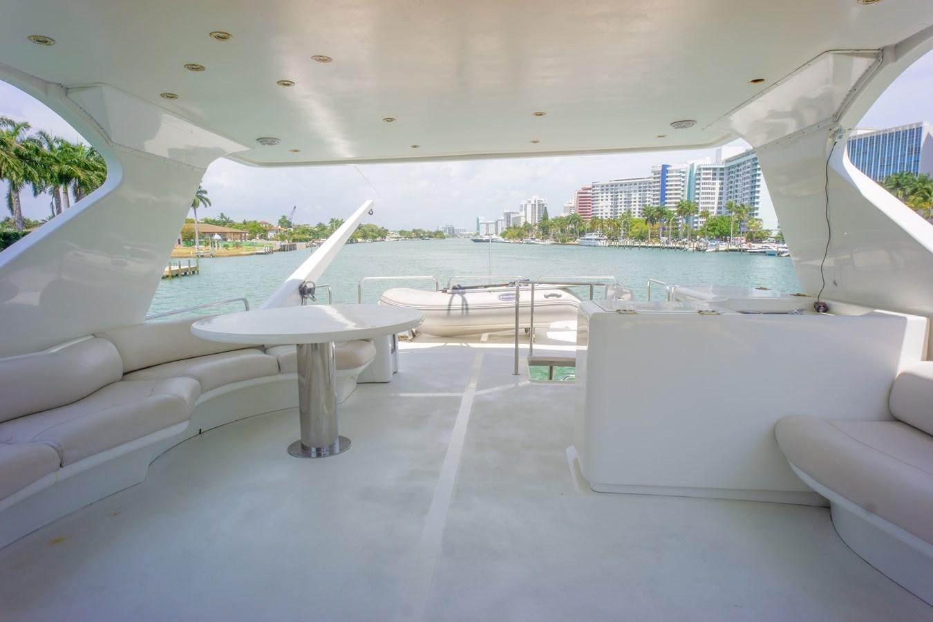 a room with a view of a city and a body of water aboard OLD SPORT II Yacht for Sale