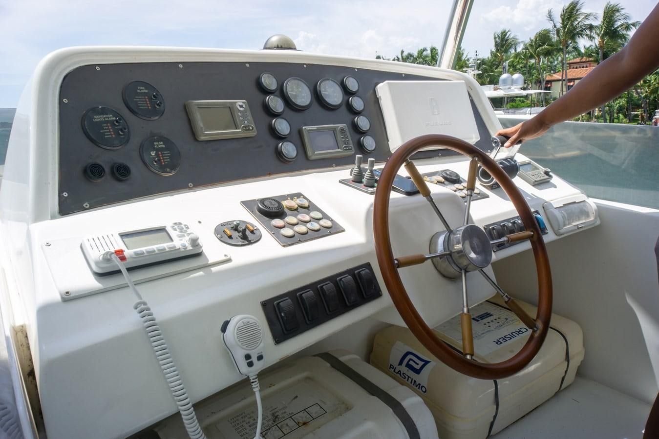 a person operating a machine aboard OLD SPORT II Yacht for Sale