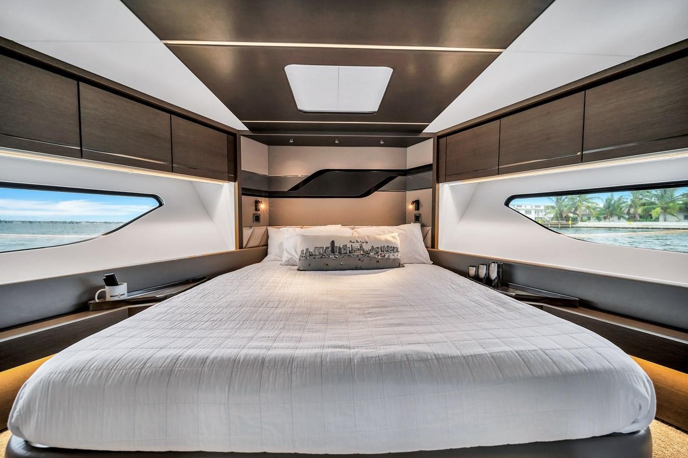 a bed with a white sheet aboard BELLOW DECK Yacht for Sale