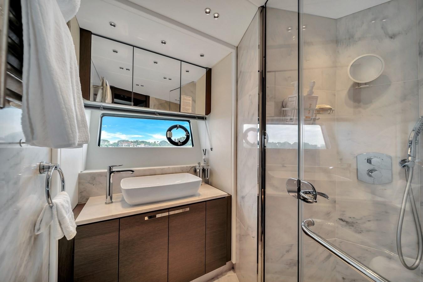a bathroom with a large mirror aboard BELLOW DECK Yacht for Sale