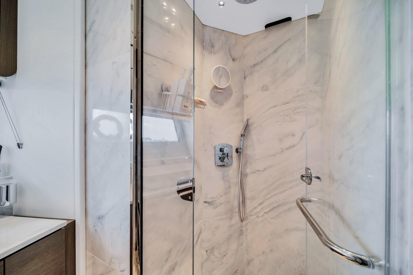 a room with a shower aboard BELLOW DECK Yacht for Sale