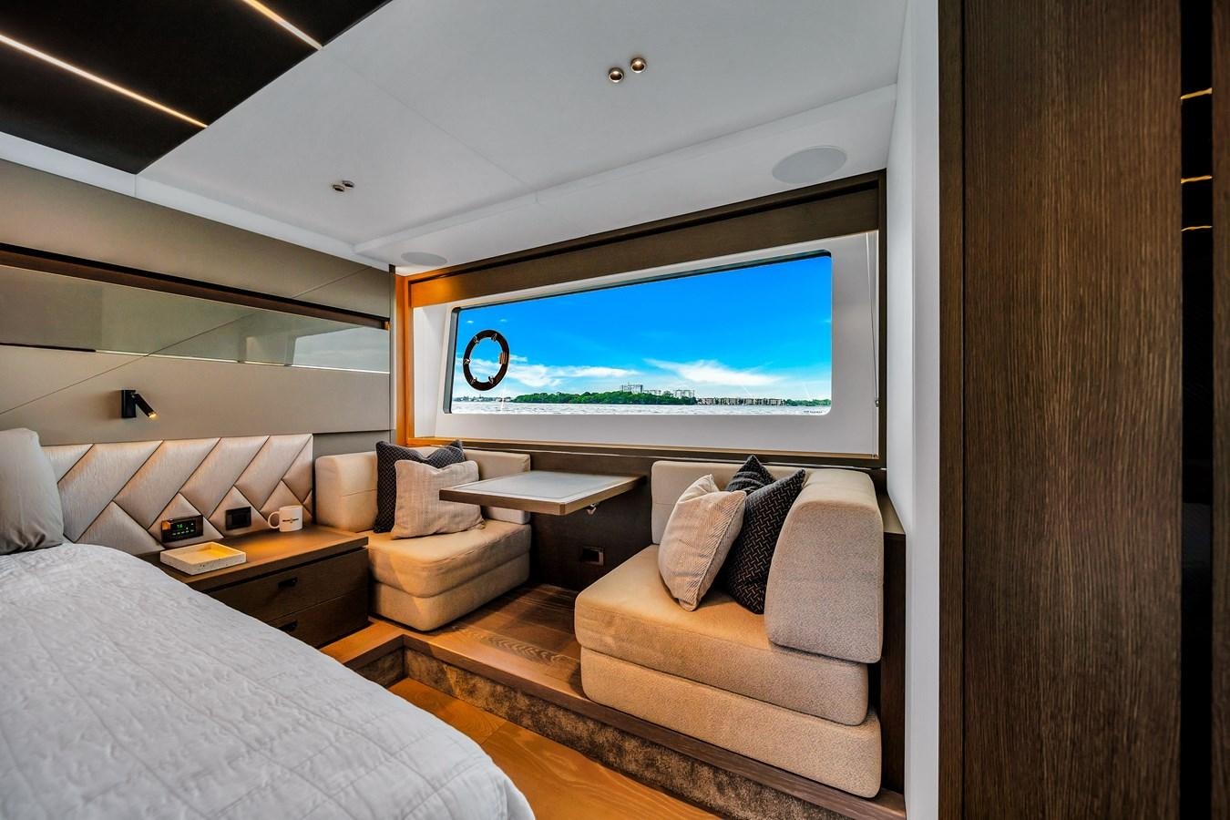 a room with a bed and a tv on the wall aboard BELLOW DECK Yacht for Sale