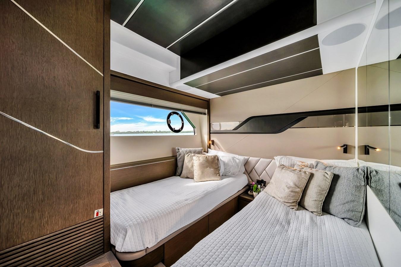 a room with two beds aboard BELLOW DECK Yacht for Sale