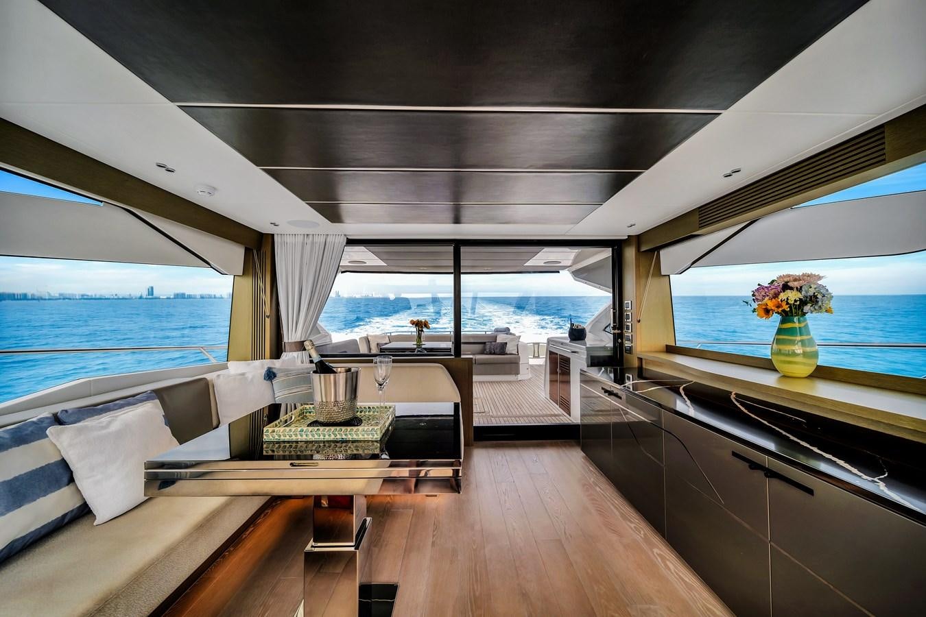 a room with a large window and a view of the ocean aboard BELLOW DECK Yacht for Sale
