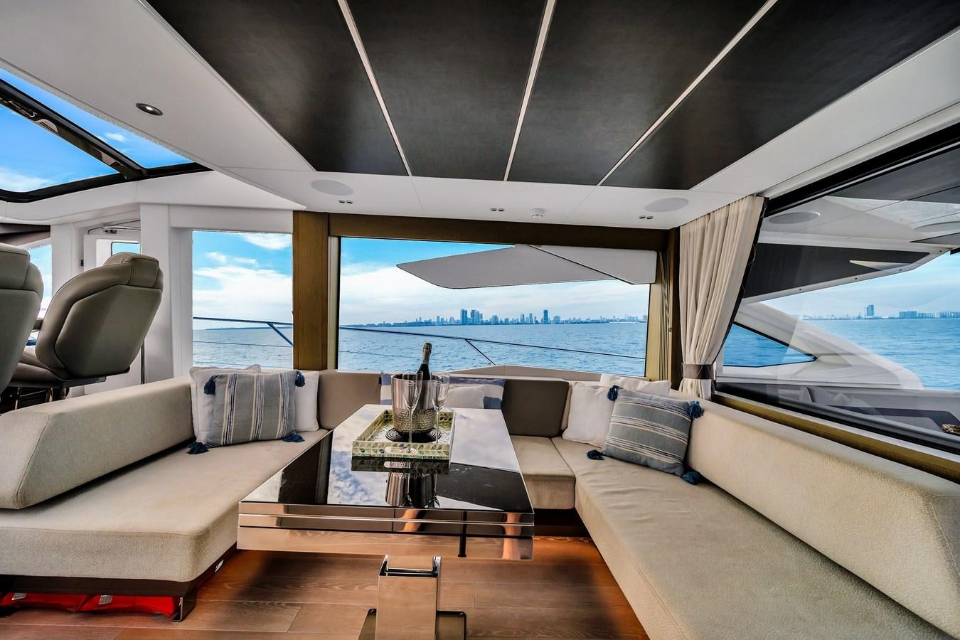 a room with a table and chairs aboard BELLOW DECK Yacht for Sale