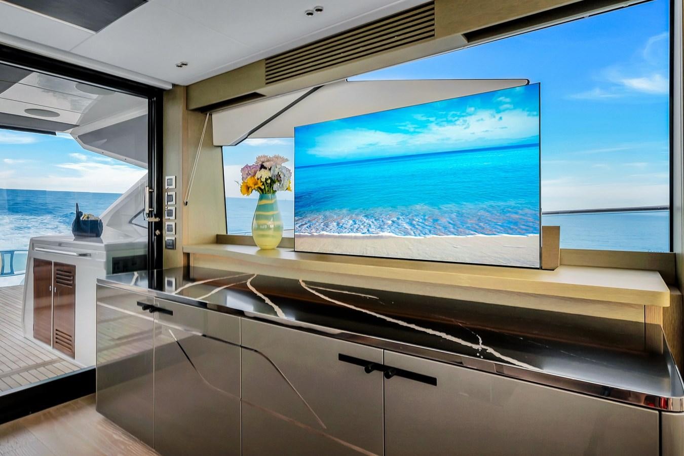 a large white room with a large window and a large blue sky aboard BELLOW DECK Yacht for Sale