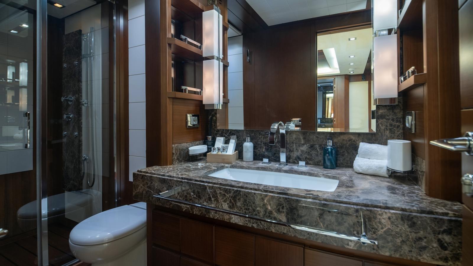 a bathroom with a large countertop aboard KOUKLES Yacht for Sale