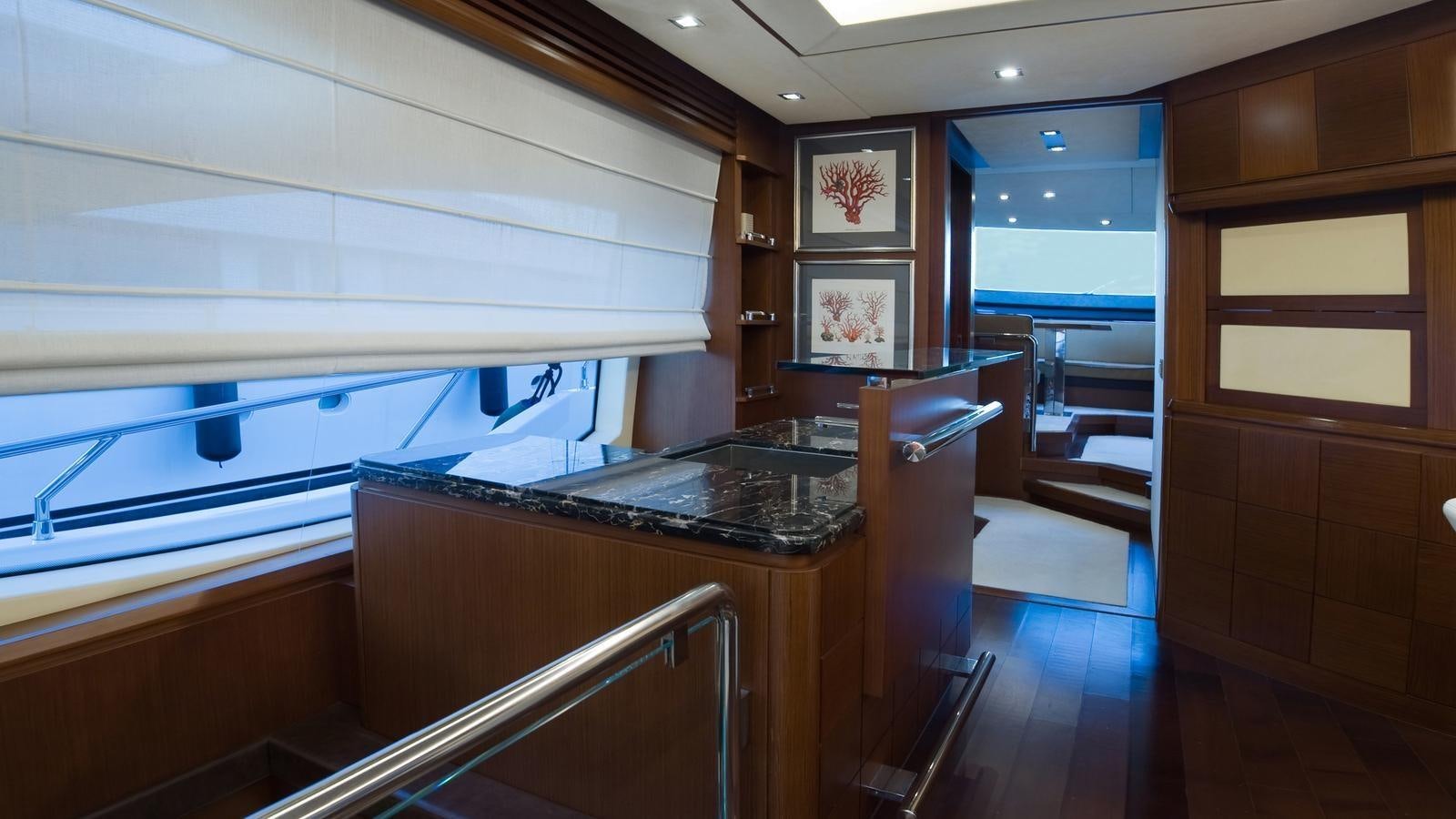 inside of a building with a bar and a pool table aboard KOUKLES Yacht for Sale