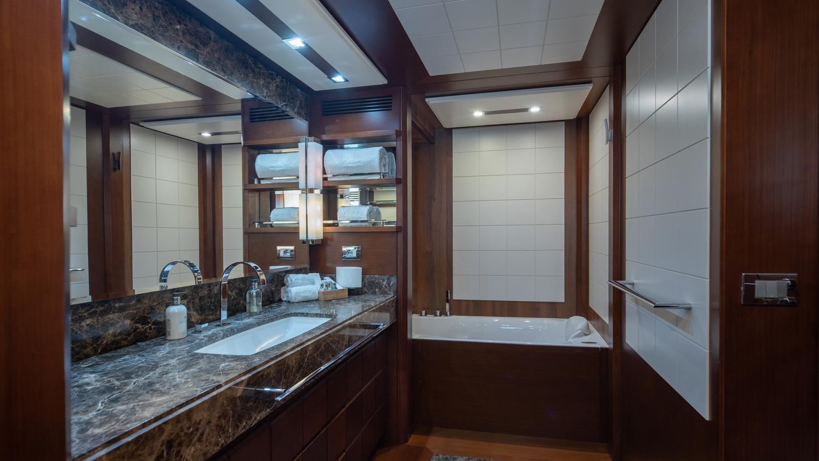 a bathroom with a large countertop aboard KOUKLES Yacht for Sale