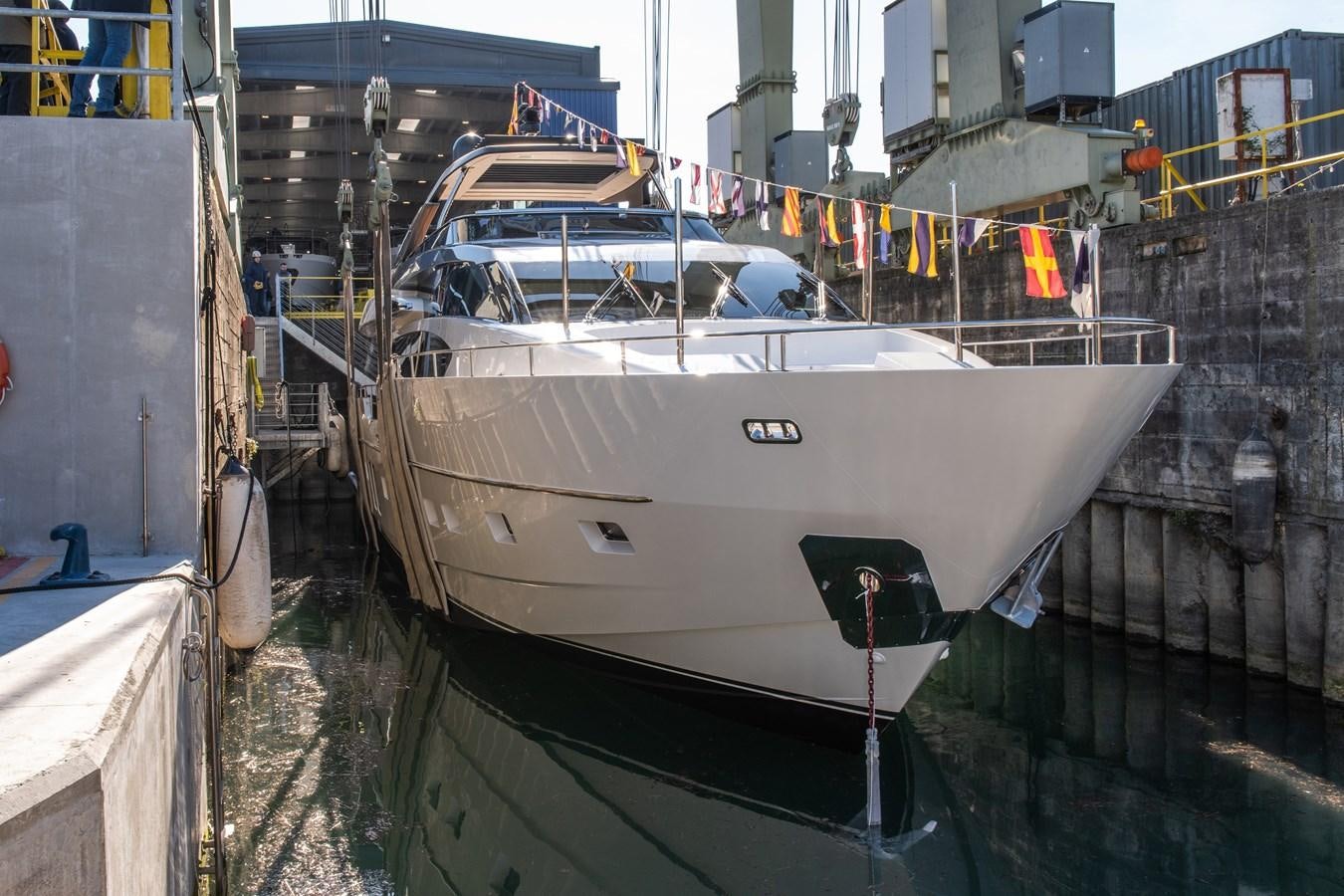 a boat docked in a harbor aboard SL86 Yacht for Sale