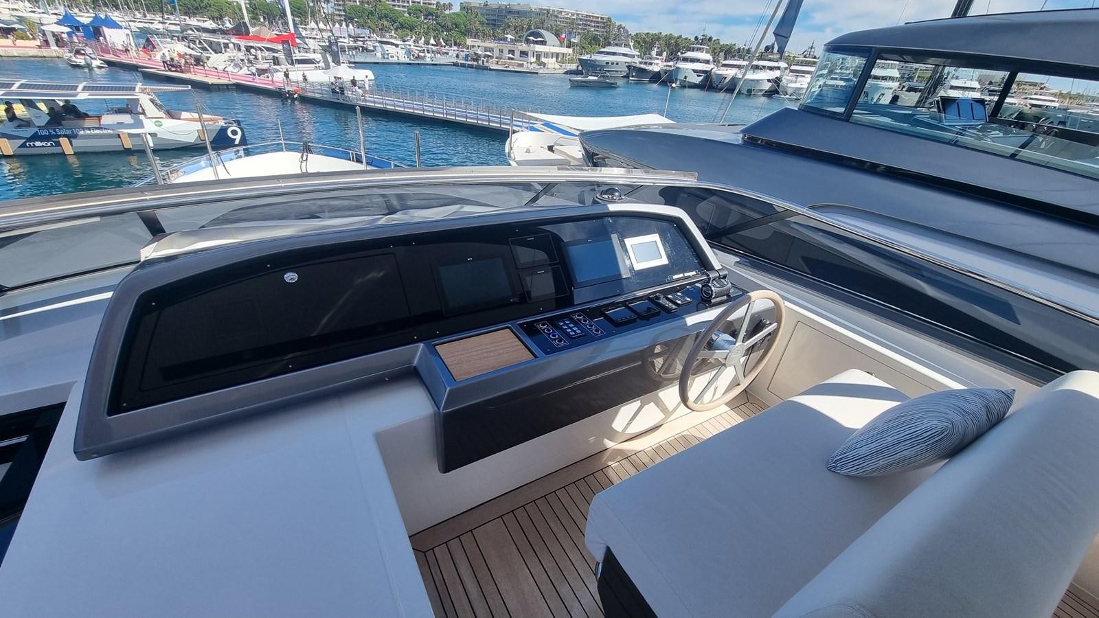 a black car on a boat aboard SL86 Yacht for Sale