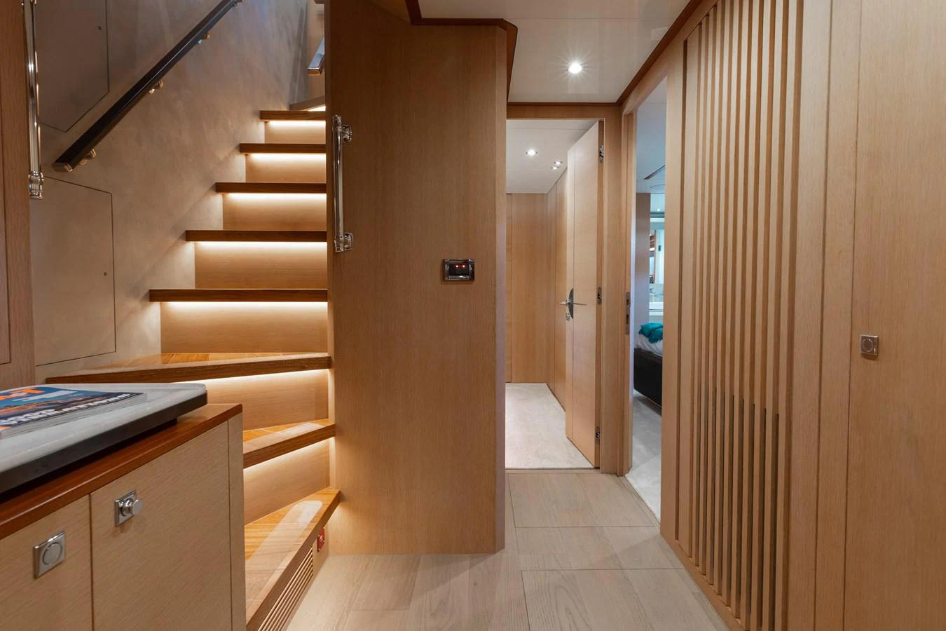 a hallway with a door and a hallway aboard ONE MORE TIME Yacht for Sale