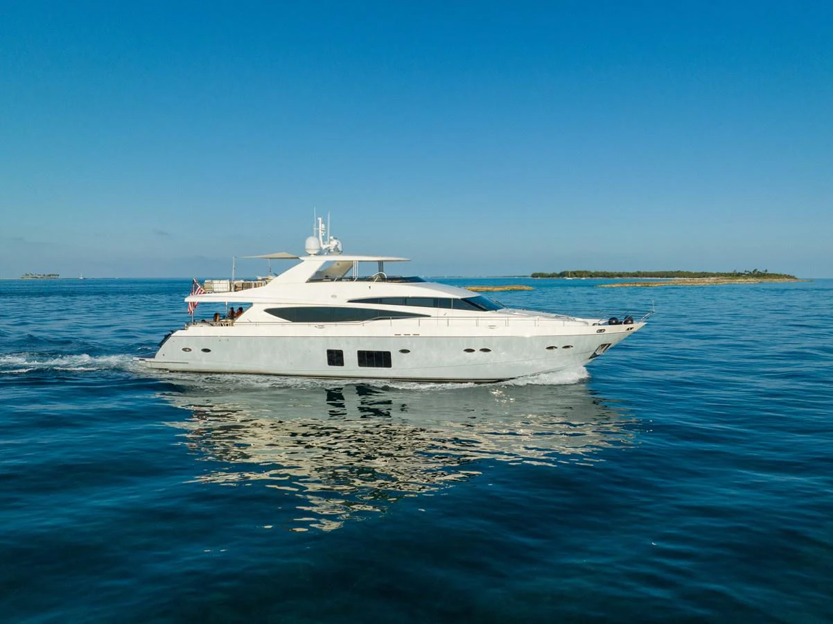 a white yacht in the water aboard CURRENT $EA Yacht for Sale