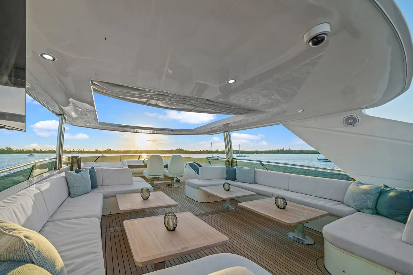 a boat with a large deck aboard CURRENT $EA Yacht for Sale