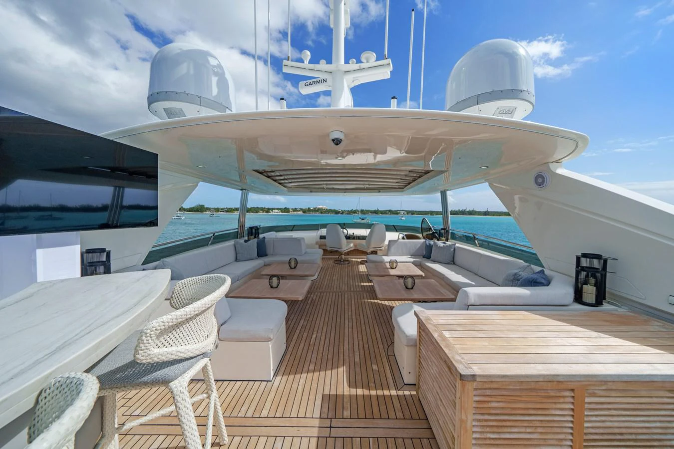 a deck with chairs and a plane aboard CURRENT $EA Yacht for Sale