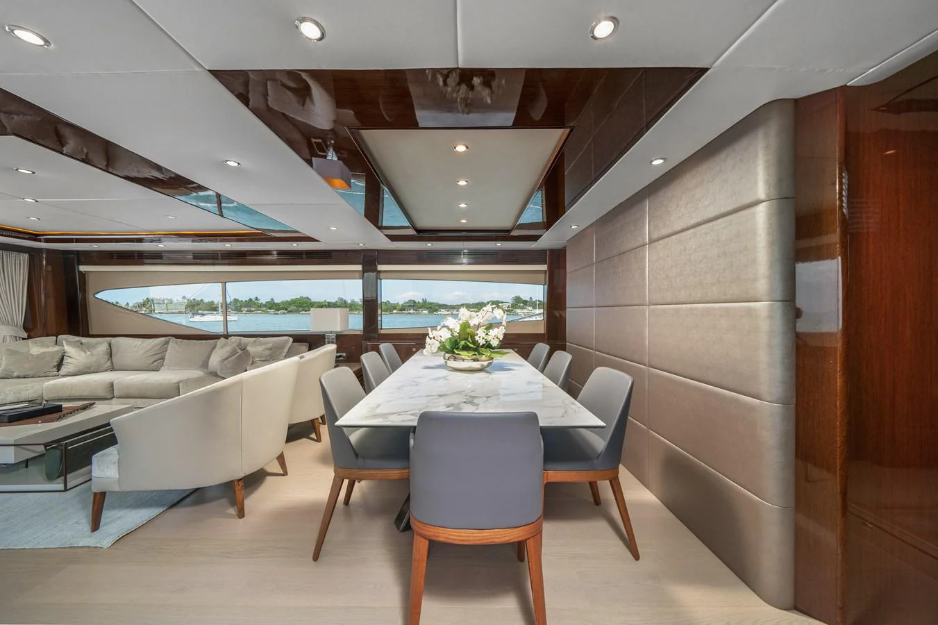 a room with a table and chairs aboard CURRENT $EA Yacht for Sale