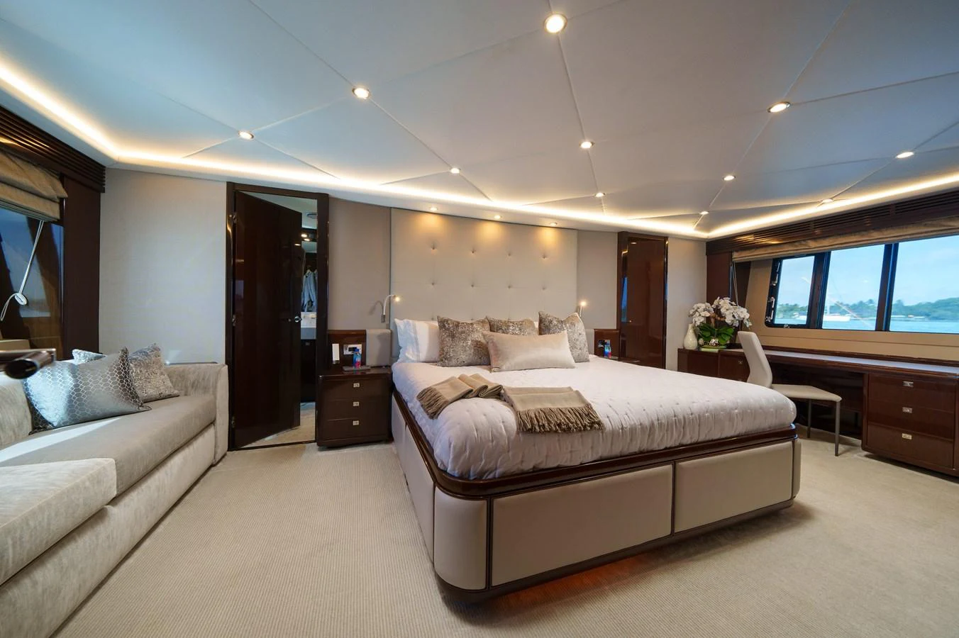 a large bedroom with a bed aboard CURRENT $EA Yacht for Sale
