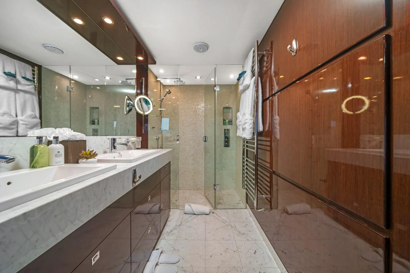a bathroom with a large tub aboard CURRENT $EA Yacht for Sale