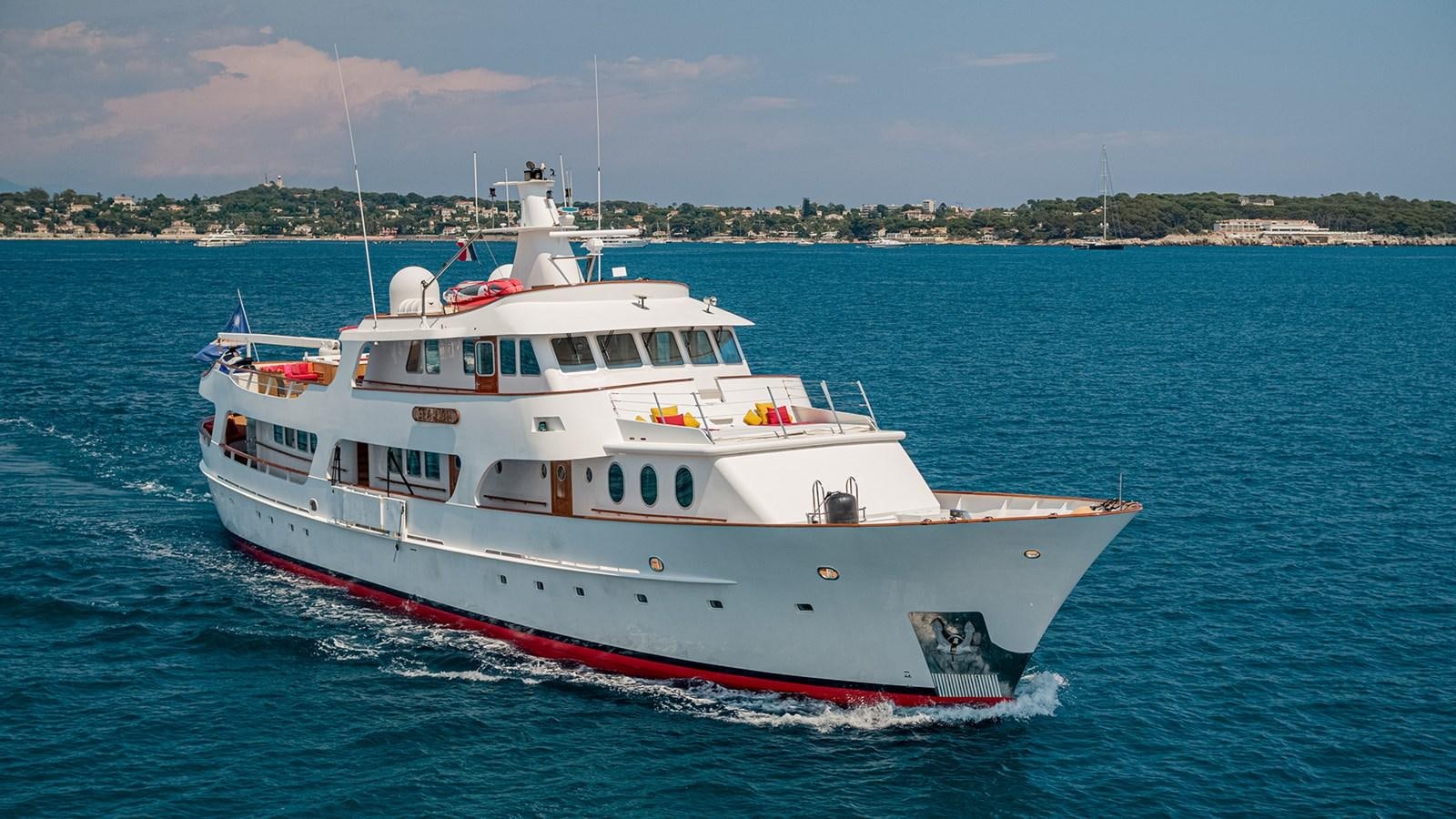 a large white boat in the water aboard SEA LION Yacht for Sale