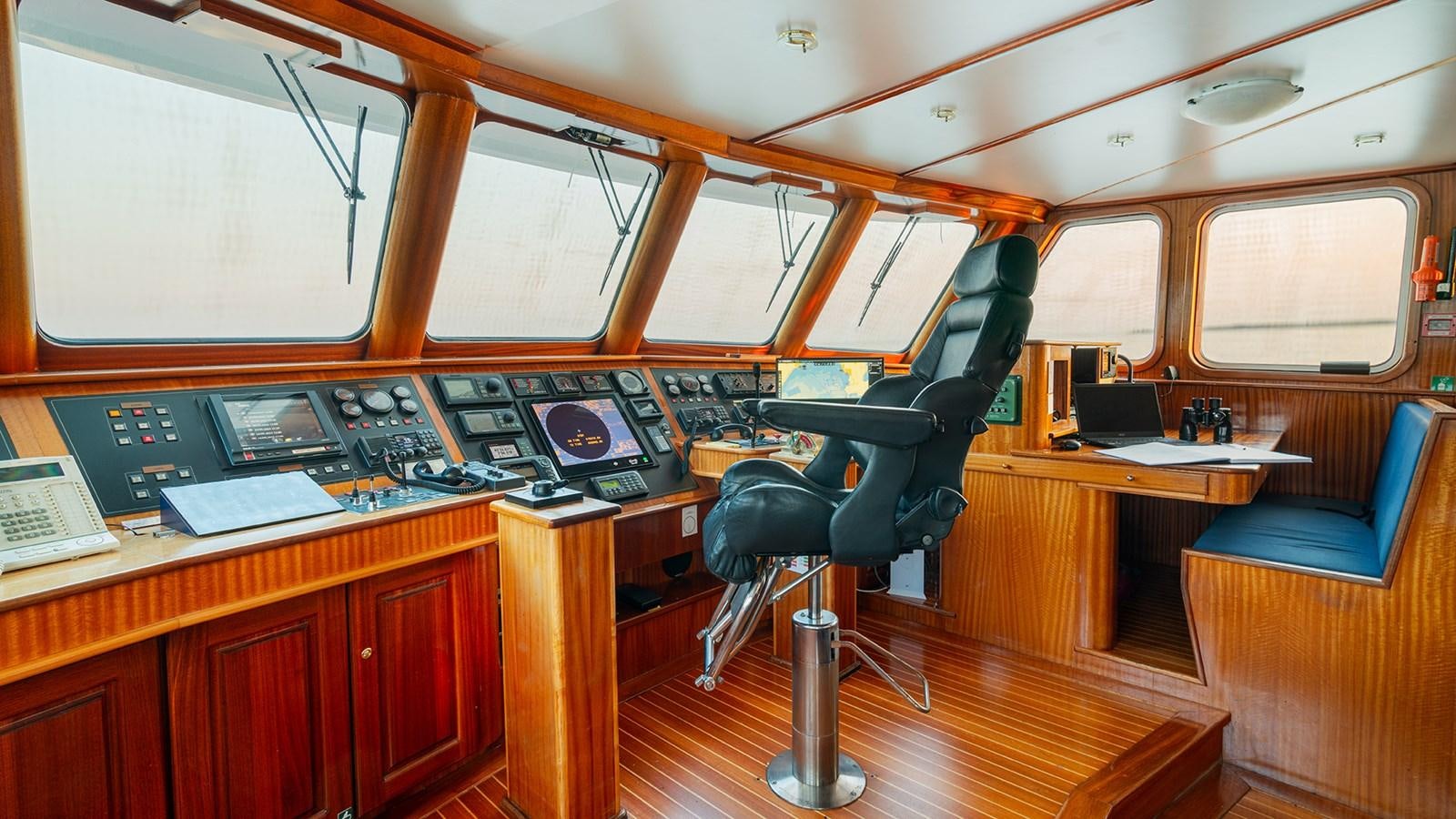 a room with a desk and computer aboard SEA LION Yacht for Sale