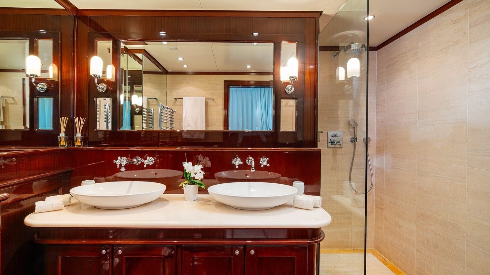 a bathroom with two sinks aboard SEA LION Yacht for Sale