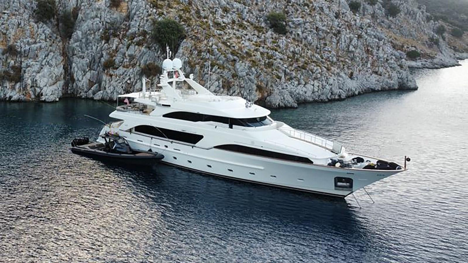 a white yacht on the water aboard B-D Yacht for Sale