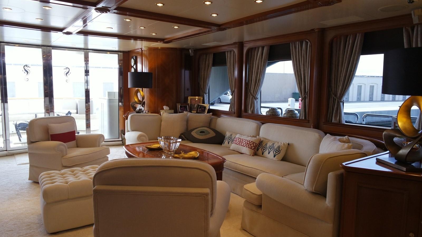 a living room with a large window aboard B-D Yacht for Sale