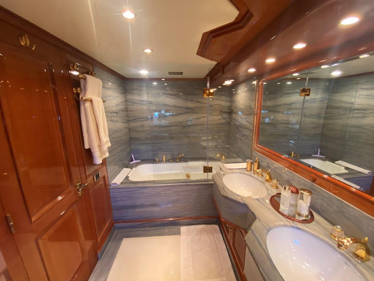 a bathroom with a large tub aboard B-D Yacht for Sale