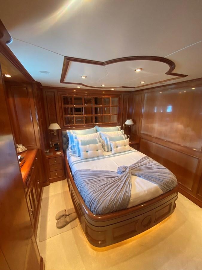 a bed in a room aboard B-D Yacht for Sale