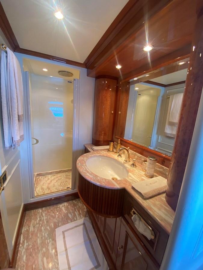 a bathroom with a sink and a mirror aboard B-D Yacht for Sale