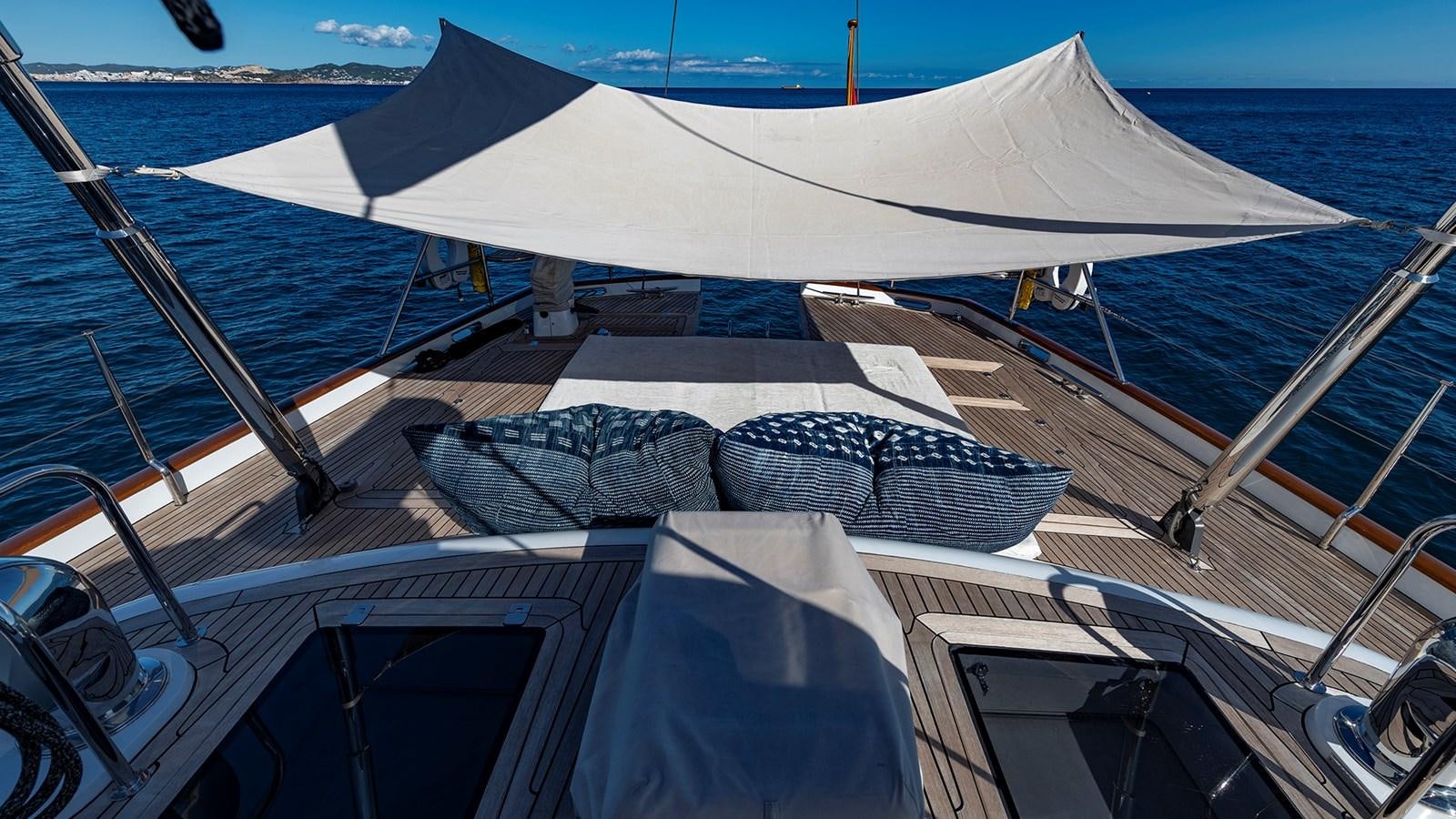 a boat with a large white tent aboard GOOD TIMES Yacht for Sale