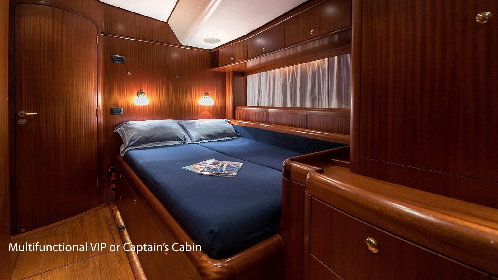 a bed in a room aboard GOOD TIMES Yacht for Sale