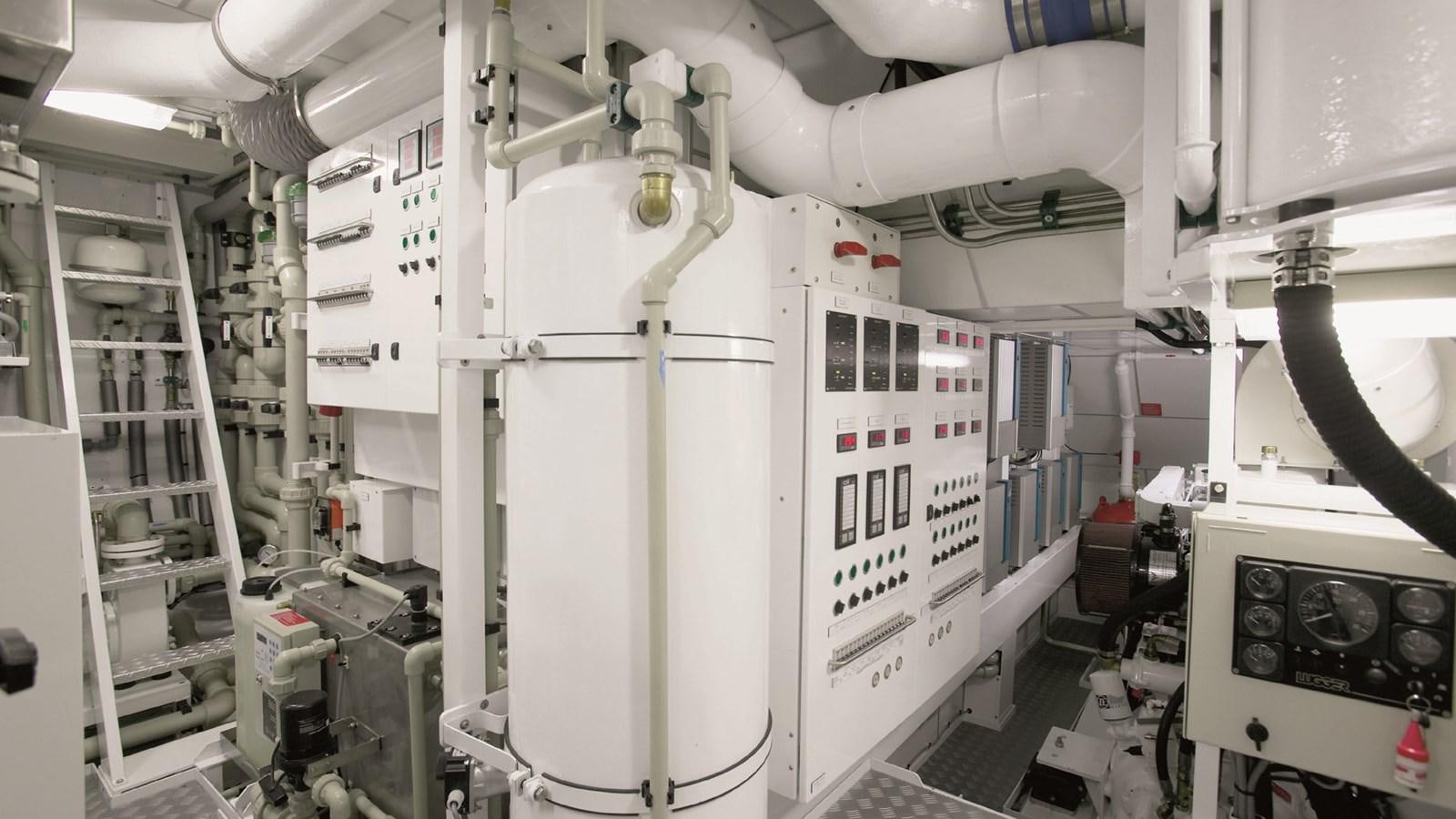 a large white machine in a factory aboard GOOD TIMES Yacht for Sale