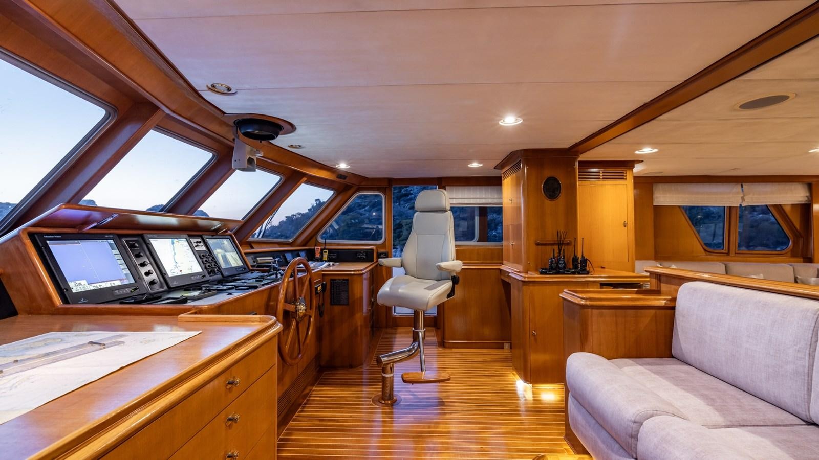 a room with a couch and a chair aboard SUNCOCO Yacht for Sale