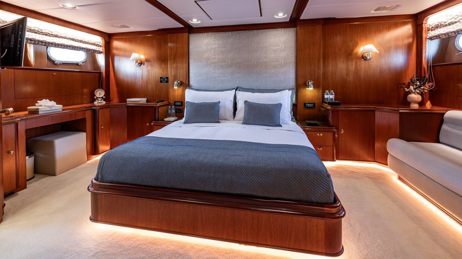 a large bedroom with a large bed aboard SUNCOCO Yacht for Sale